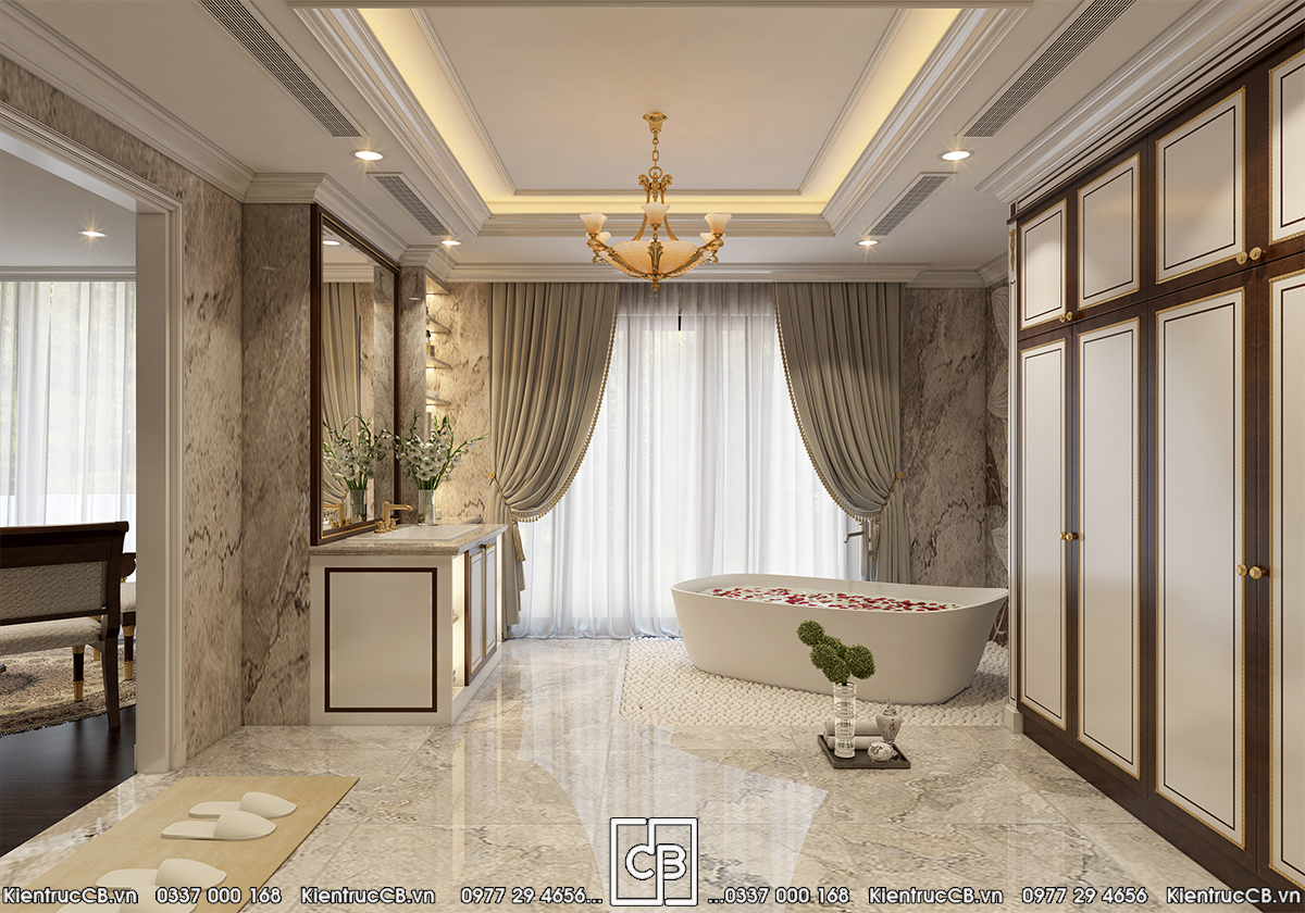 Khu phòng tắm với bồn tắm, mảng tường có vân và hệ trần sáng
